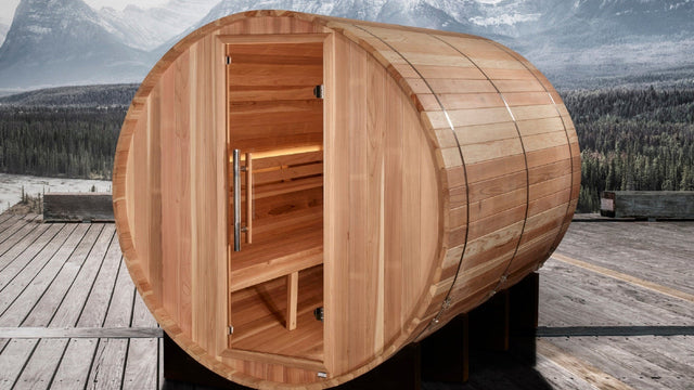 Golden Designs Klosters cedar barrel sauna on an outdoor deck