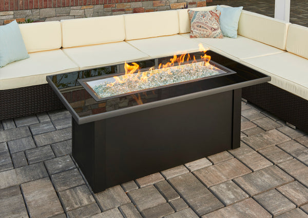 Monte Carlo Linear Gas Fire Pit Table — with the burner lit