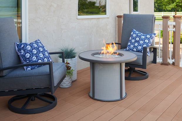 Stonefire 32" Round Gas Fire Pit Table — with the burner lit