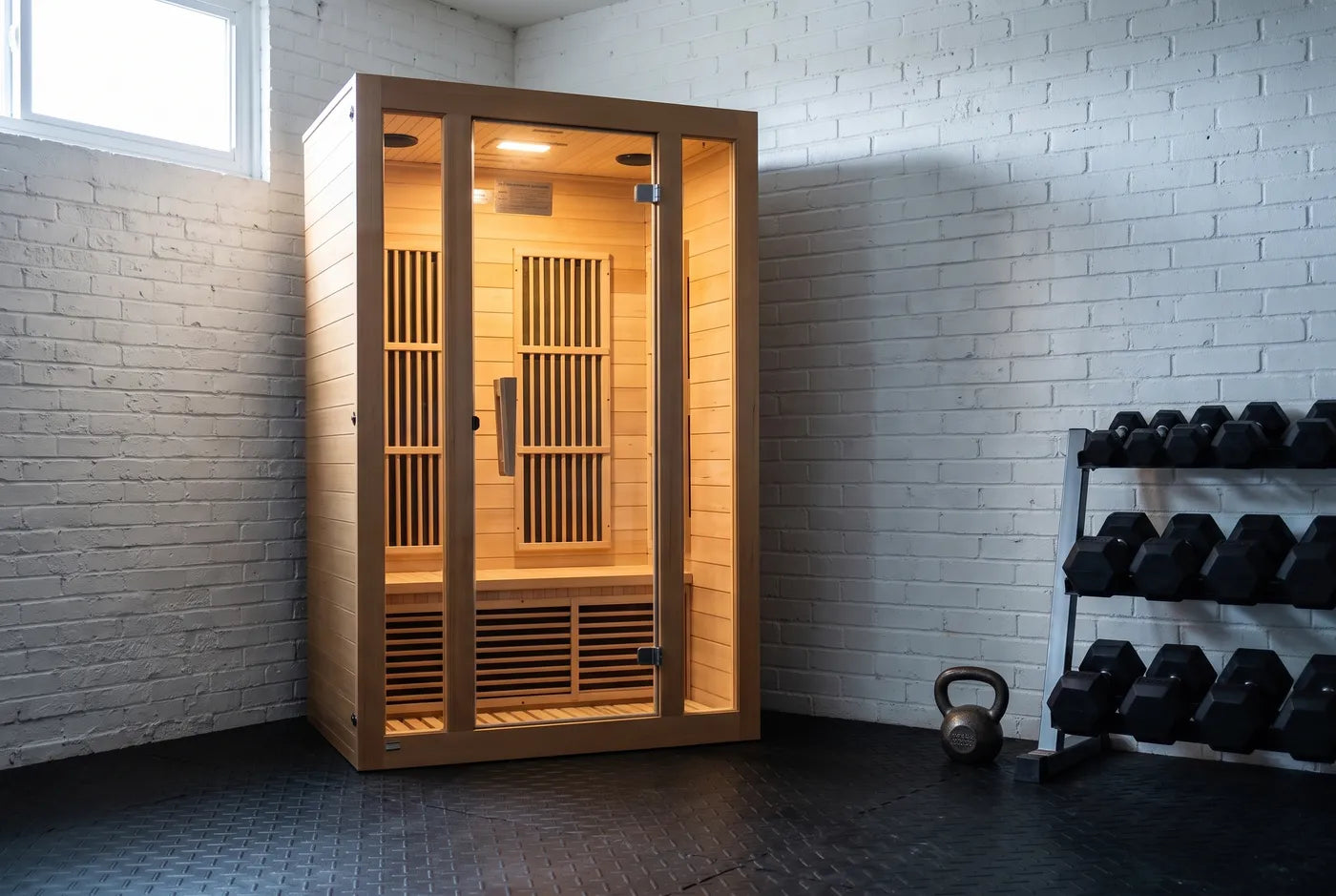 Maxxus infrared sauna in a converted home garage gym